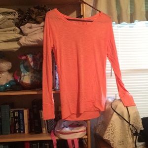 Pink,medium  with a seer like material definitely see though